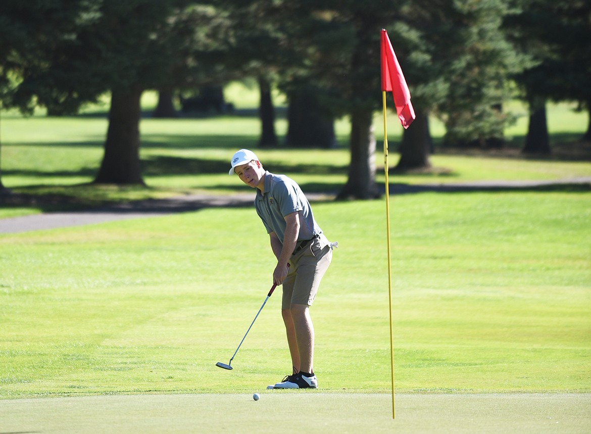 Cameron Kahle hits a putt during the Whitefish Invite on Tuesday at Whitefish Lake Golf Club. (Daniel McKay/Whitefish Pilot)