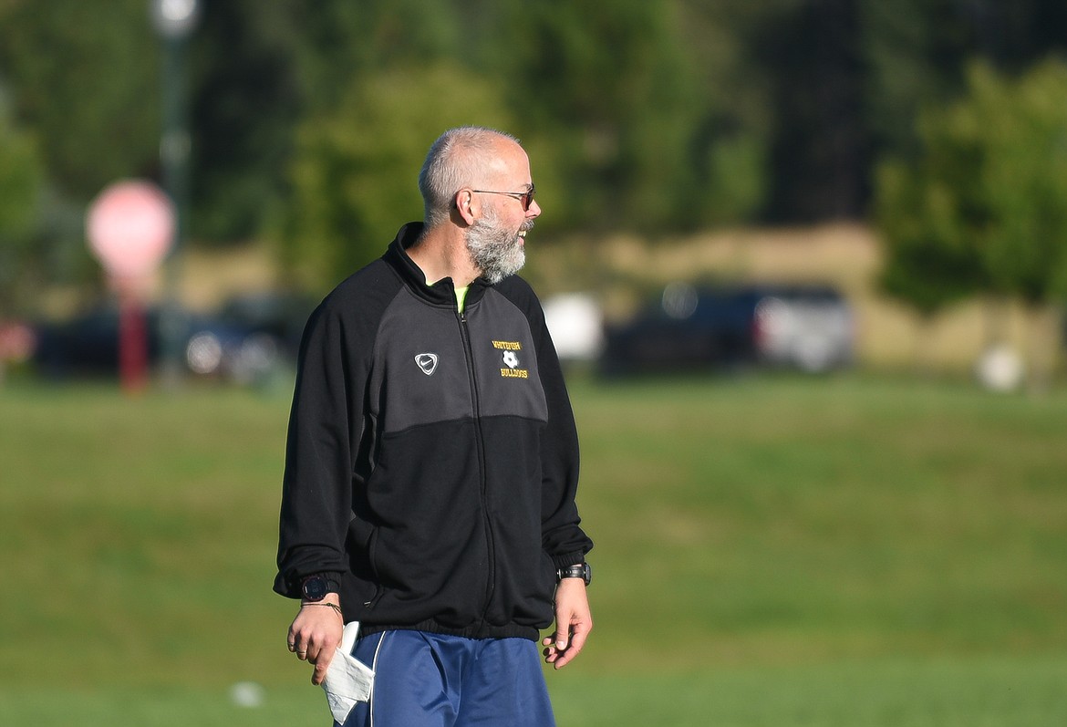 Head coach John Lacey watches his team during an early season practice. (Daniel McKay/Whitefish Pilot)