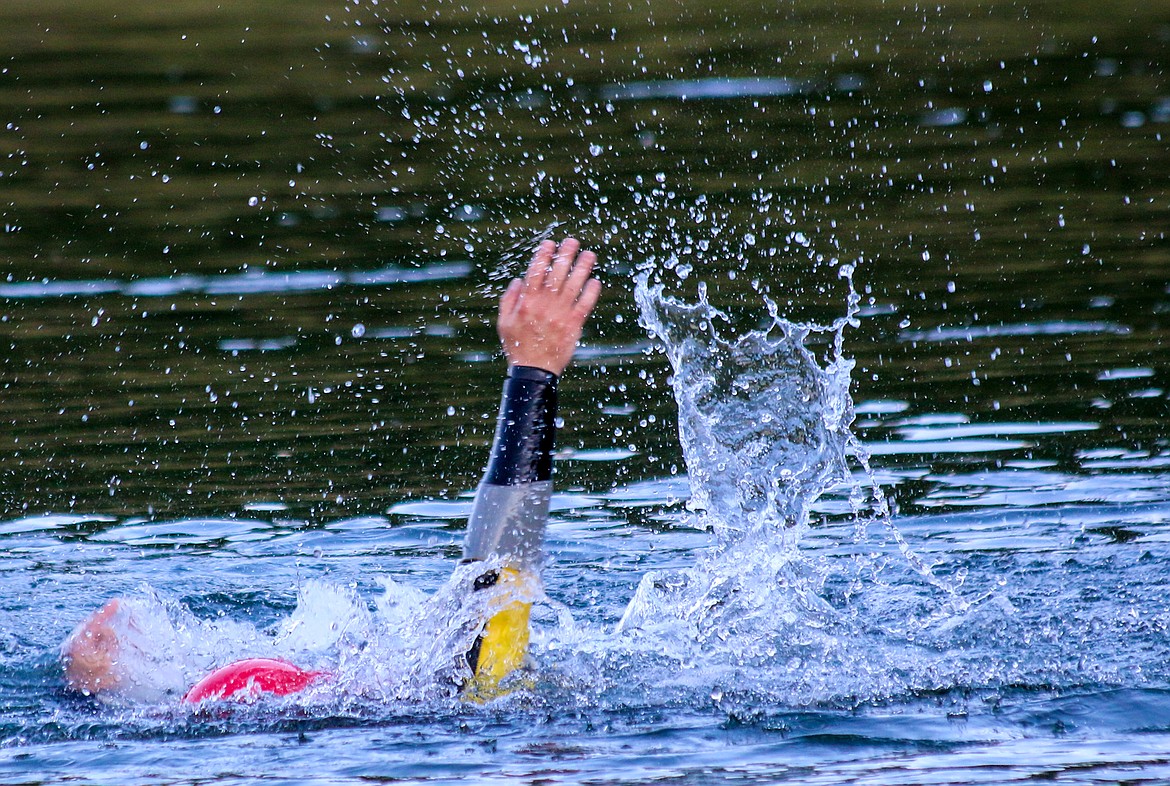 Photo by MANDI BATEMAN
Playing the part of a victim nearly drowing, Boundary Search and Dive Rescue Commander Tony Jeppesen made the scenario as realistic as possible.