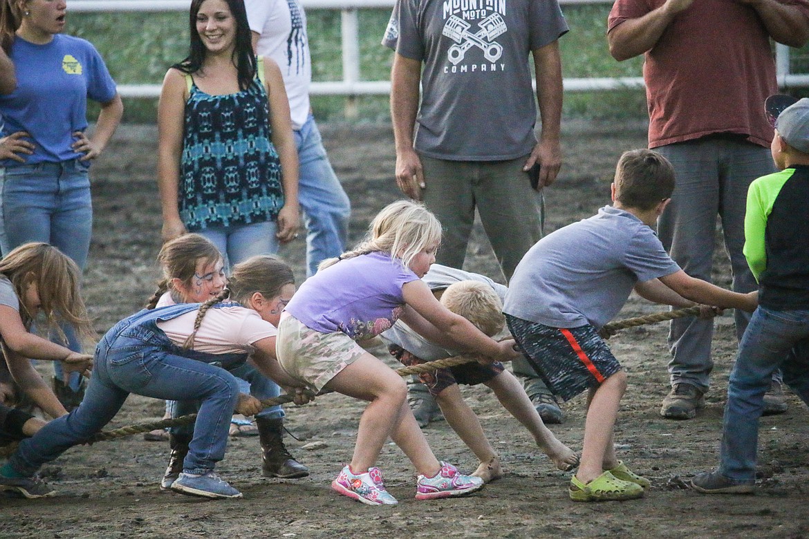 Photo by MANDI BATEMANTug of war, fun in the dirt.