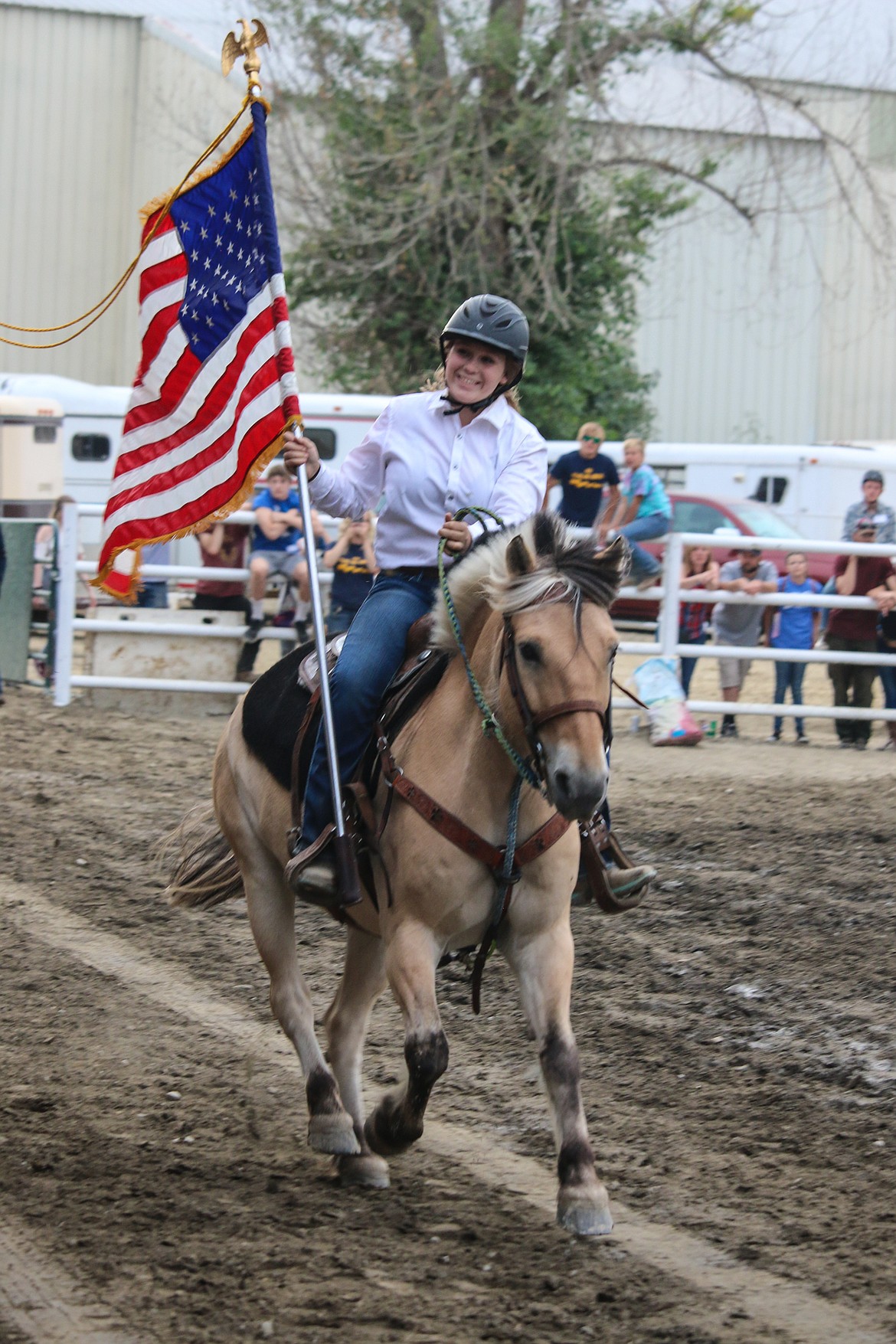 Photo by MANDI BATEMANThe American Flag was carried proudly around the arena during the opening of Family Fun Night.