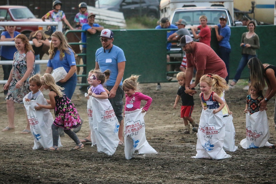 Photo by MANDI BATEMANParents encouraged the kids as they raced.