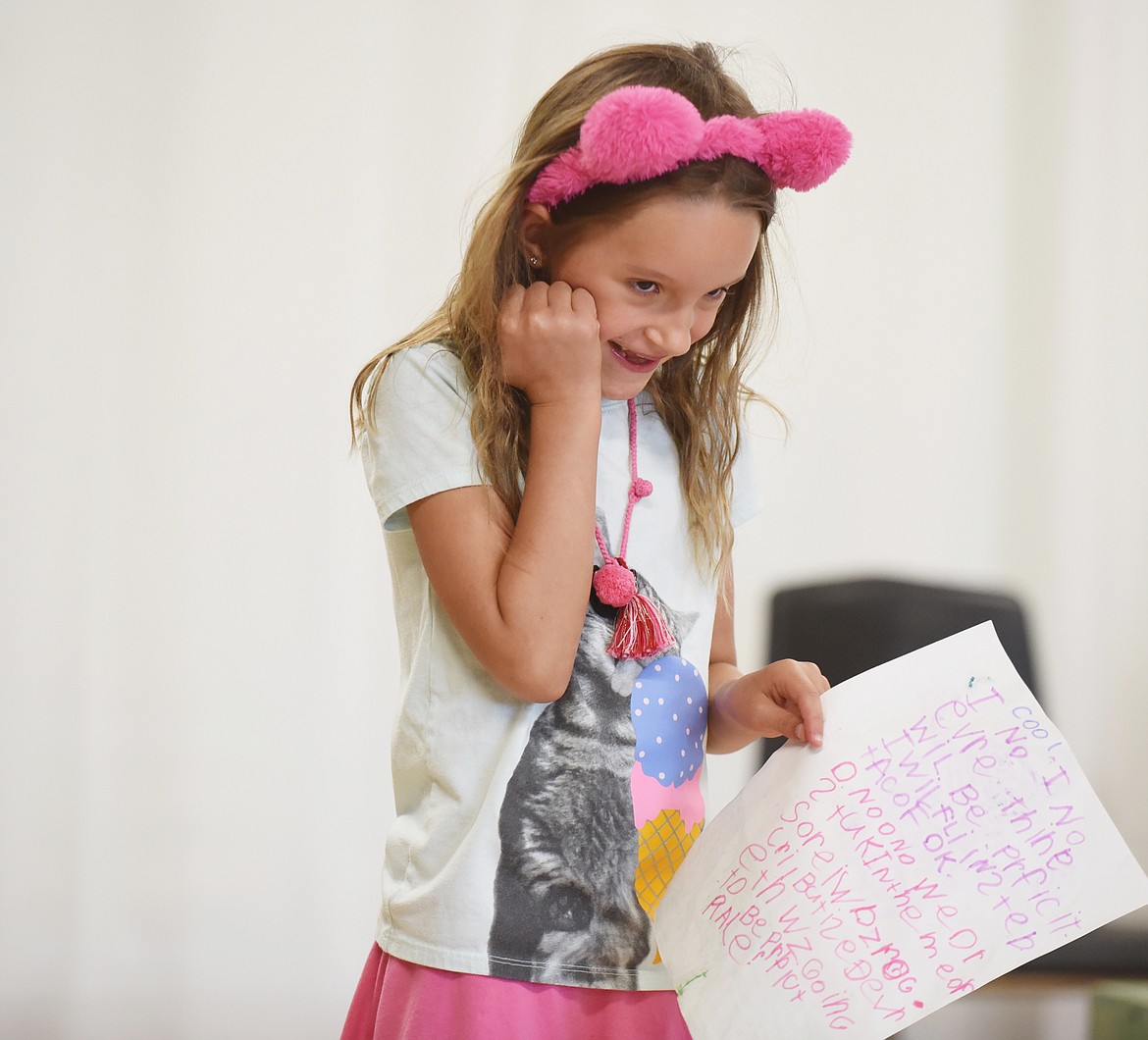 Bronwen Prew pretends to cry while holding her script during a practice session at the Whitefish Theatre Co. summer performance camp recently at the O&#146;Shaughnessy Center. Participants wrote the play and brought it to life for the audience in one week. (Heidi Desch/Whitefish Pilot)