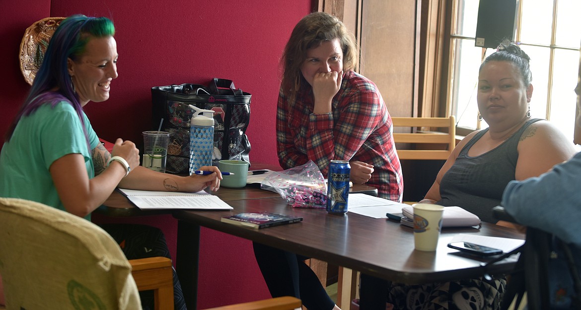 GOOD COFFEE Roasting company patrons Roxanne Hamann, Benita Chuey, and Beverly Powell all converse during a Sunday morning coffee session. (Jason Blasco/Lake County Leader)