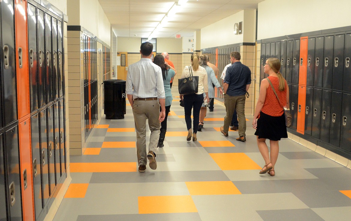 People tour the recently finished remodel and addition at Flathead High School in Kalispell on Tuesday. (Matt Baldwin/Daily Inter Lake)