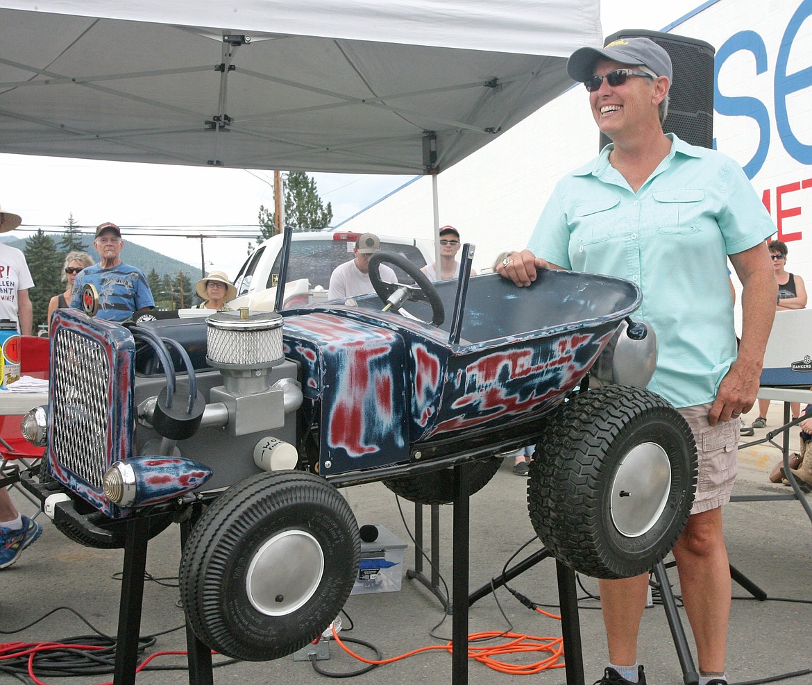 Edee D'Andrea of Lane, Idaho was this year's winner of the pedal car. After the awards ceremony Edee donated the car back to the club to be auctioned off and proceeds donated to the family of Asher Prosise-Dunham who is in need of a heart transplant. The auction netted $600 due to the combined efforts of Randy Stewart and Will Webberding. (Paul Sievers/The Western News)