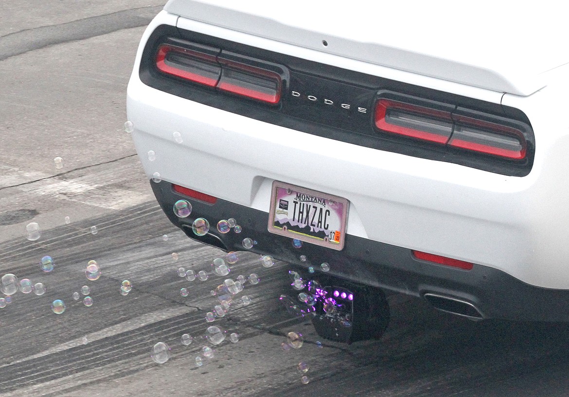 Friday night's cruise of the &quot;gut&quot; included Tracy McNew's Dodge, complete with a bubble machine. (Paul Sievers/The Western News)