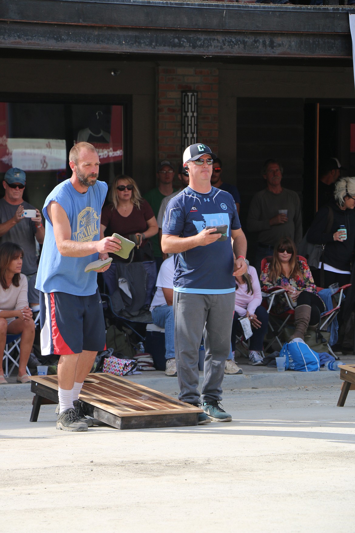 (Daily Bee file photo/CAROLINE LOBSINGER)Ryan Huffey, left, and Len Hiatt compete the finals of the inaugural Cornhole Classic Tournament in 2018. This year's tournament again comes to historic First Avenue in downtown Sandpoint with a full slate of action on Sept. 14.