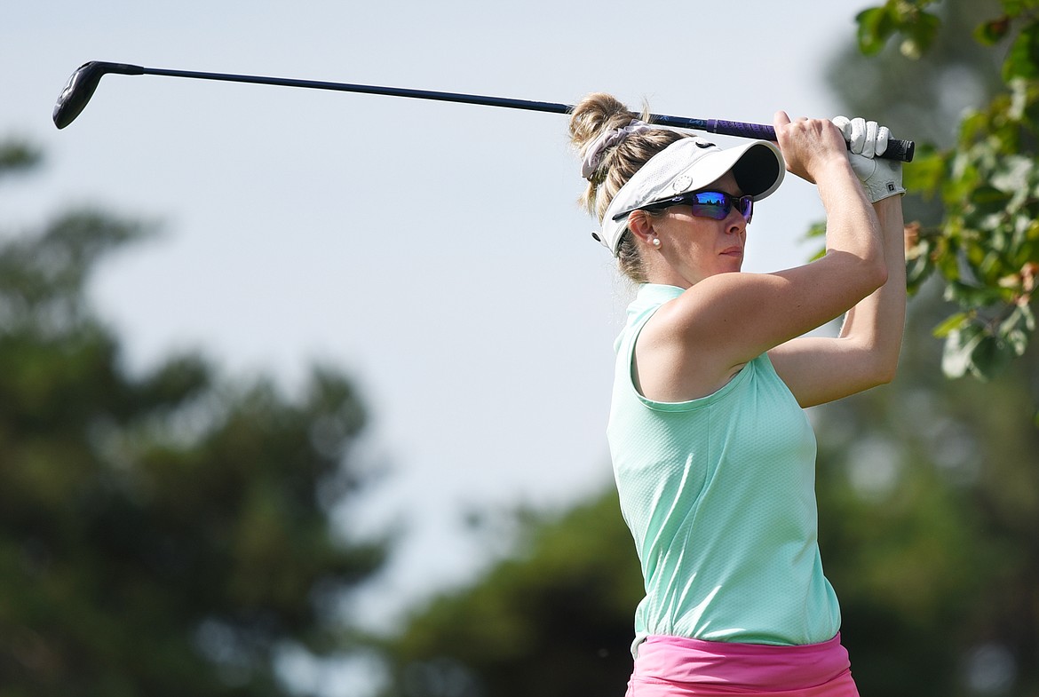 Two-time defending champion and four-time winner Kali Gordon, of Okotoks, Alberta, watches her tee shot on hole three of the Championship 18 Course during the Labor Day Tournament at Buffalo Hill Golf Club in Kalispell on Saturday. (Casey Kreider/Daily Inter Lake)