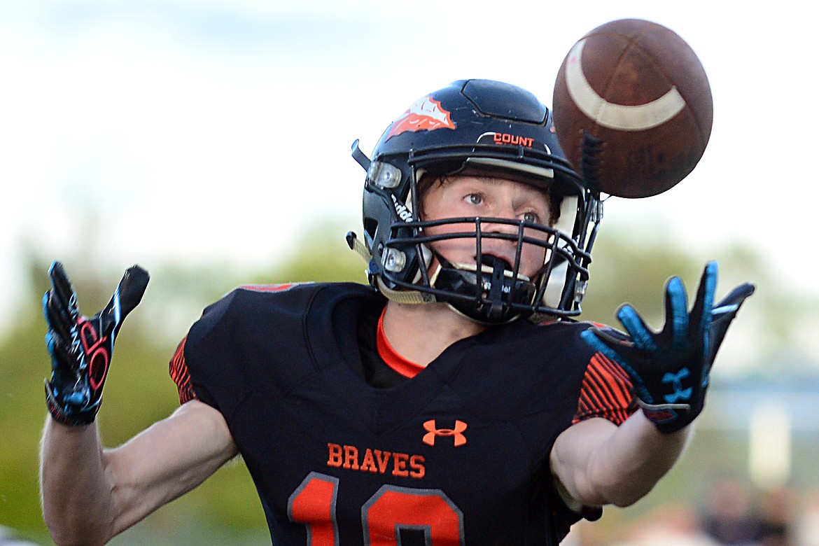 Flathead wide receiver Tommy Wells (10) catches a pass from quarterback Cooper Smith in the first half against Bozeman at Legends Stadium on Friday. (Casey Kreider/Daily Inter Lake)