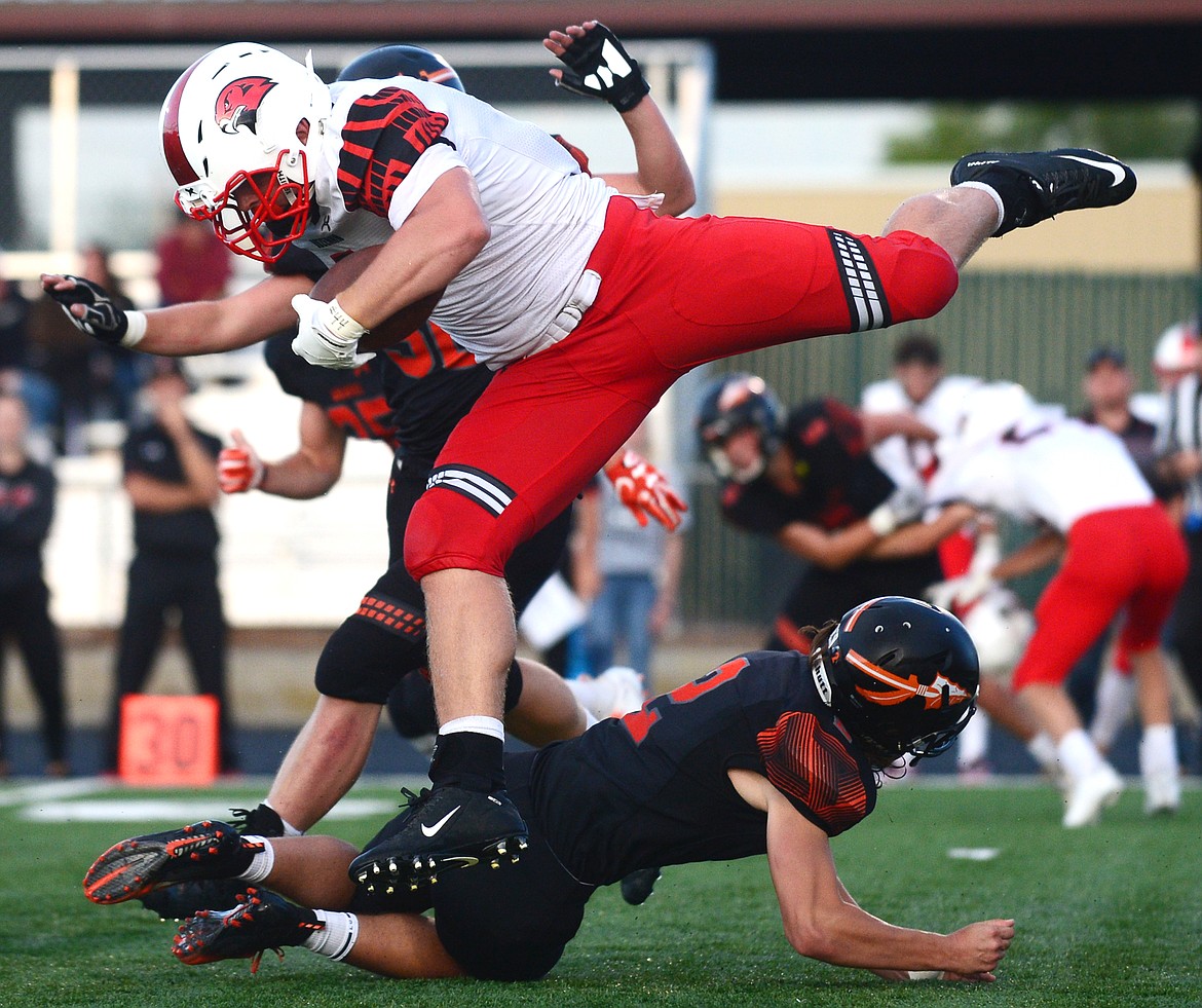 Bozeman running back Kenneth Eiden (7) picks up yardage on a first-half run against Flathead at Legends Stadium on Friday. (Casey Kreider/Daily Inter Lake)