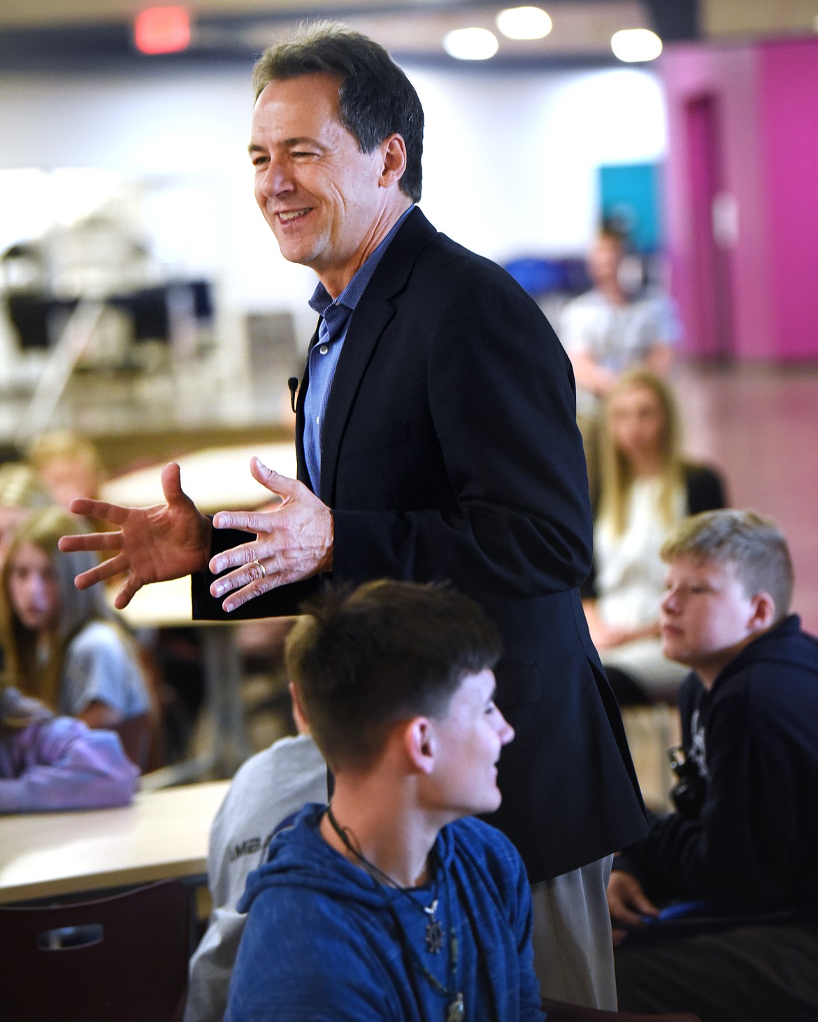 Governor Steve Bullock sits with the West Valley School student ambassadors on Thursday, August 29, as he tours the building and discusses the Education Super Highway.(Brenda Ahearn/Daily Inter Lake)