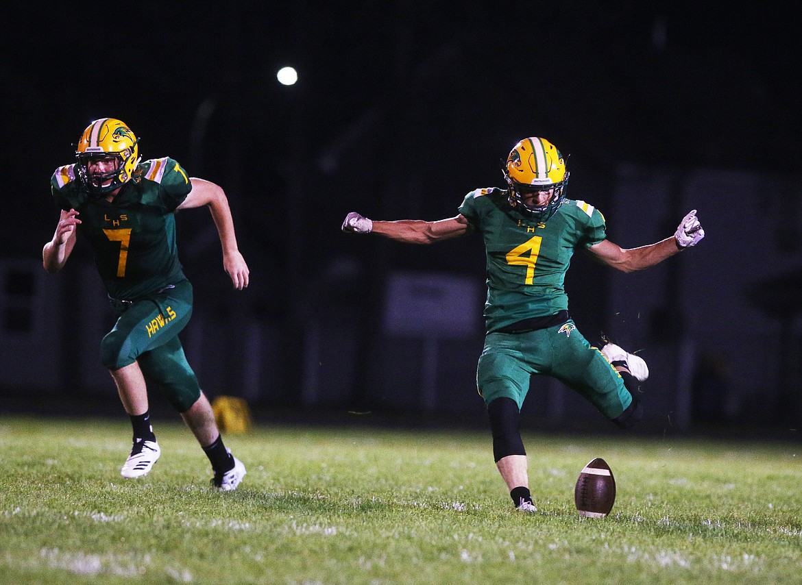 Collin Bell of Lakeland High kicks the ball off to Rogers after a score Friday night.