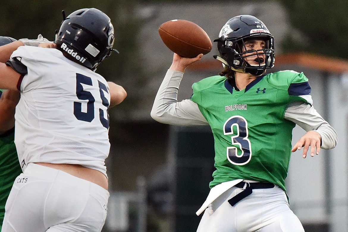 Glacier quarterback JT Allen (3) drops back to pass in the first half against Mount Spokane at Legends Stadium on Friday. (Casey Kreider/Daily Inter Lake)