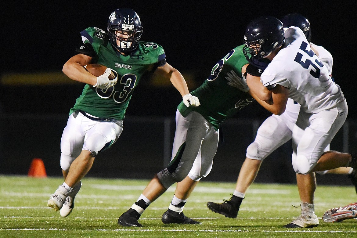 Glacier running back Jake Rendina (33) breaks free in the third quarter against Mount Spokane at Legends Stadium on Friday. (Casey Kreider/Daily Inter Lake)