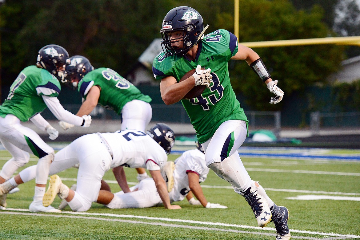 Glacier's KJ Johnson (43) returns a kickoff in the first quarter against Mount Spokane at Legends Stadium on Friday. (Casey Kreider/Daily Inter Lake)