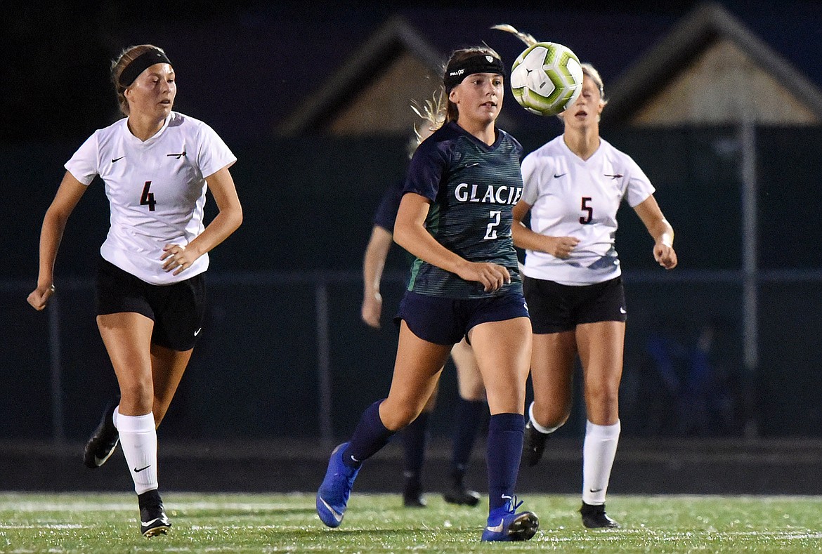 Glacier's Emily Cleveland (2) plays the ball upfield against Flathead  during crosstown soccer at Legends Stadium on Thursday. (Casey Kreider/Daily Inter Lake)