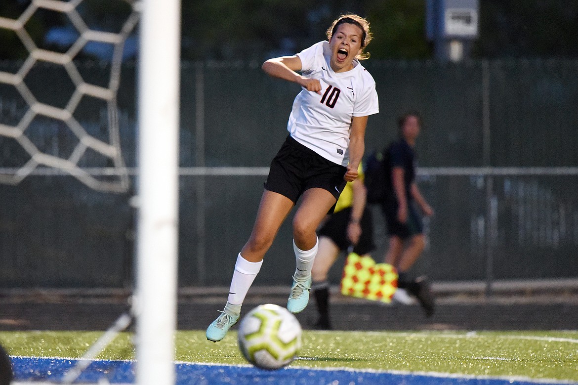 Flathead's Ashlynn Whiteman (10) celebrates as she watches her first-half goal roll towards the net against Glacier during crosstown soccer at Legends Stadium on Thursday. (Casey Kreider/Daily Inter Lake)