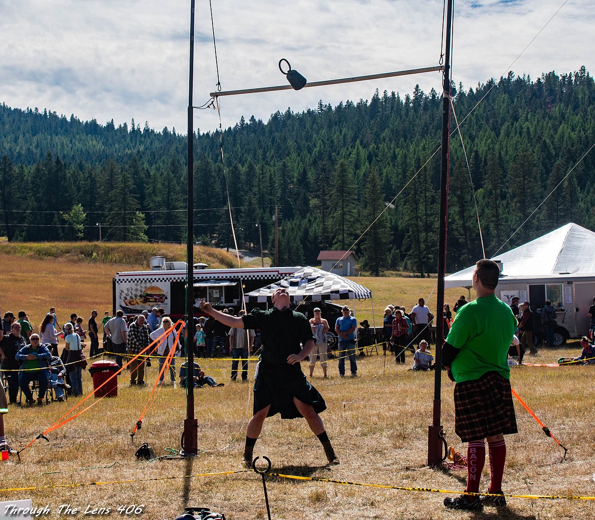 Weight over Bar Highland Game, also known as Weight for Height. The athletes attempt to toss a 56-pound (4-stone) weight with an attached handle over a horizontal bar using only one hand. Each athlete is allowed three attempts at each height. Successful clearance of the height allows the athlete to advance into the next round at a greater height. The competition is determined by the highest successful toss with fewest misses being used to break tie scores. (Photo courtesy of Julie Tuck)