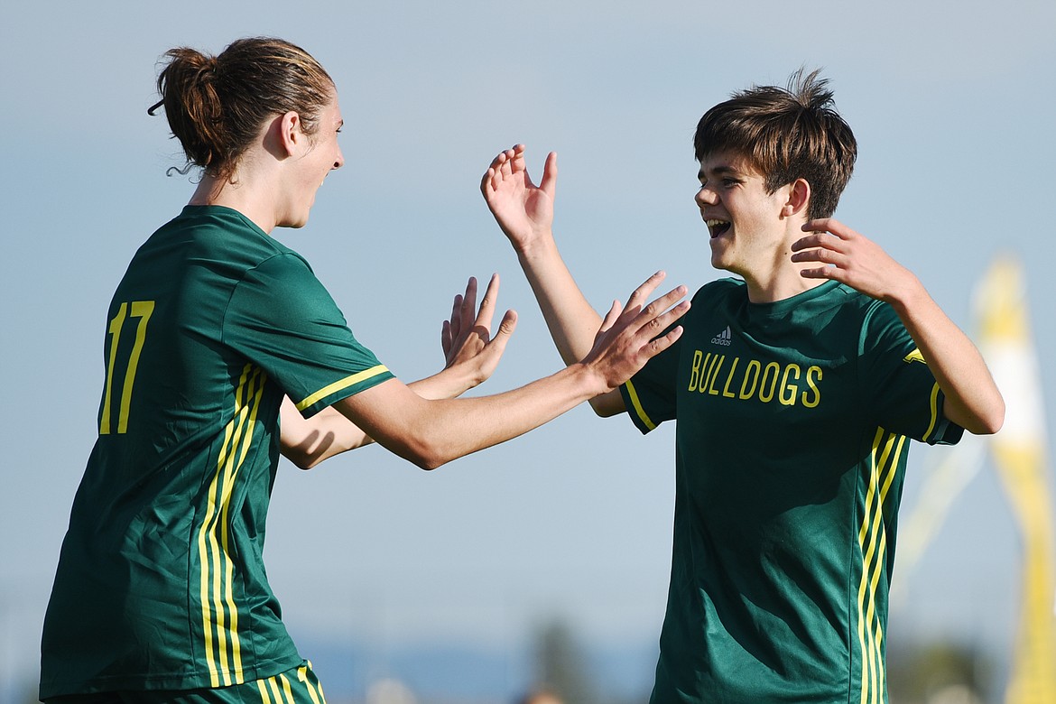 Whitefish's James Thompson (17) celebrates with Ian Lacey (7) after Lacey's first goal of the game against Columbia Falls at Smith Fields on Tuesday. (Casey Kreider/Daily Inter Lake)