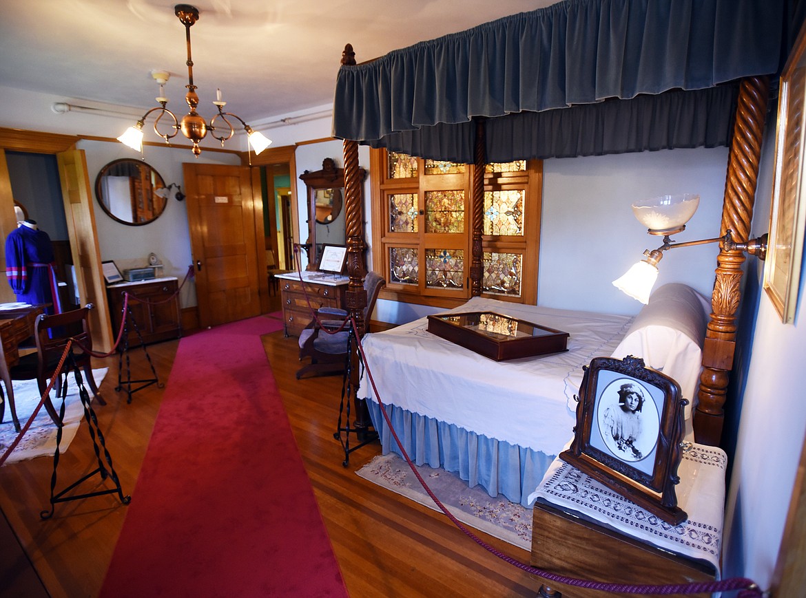 Alicia CONRAD&#146;s bedroom has been sponsored by Amore Salon and Spa. The photograph in the right is of Alicia, age 23, taken at her first wedding.