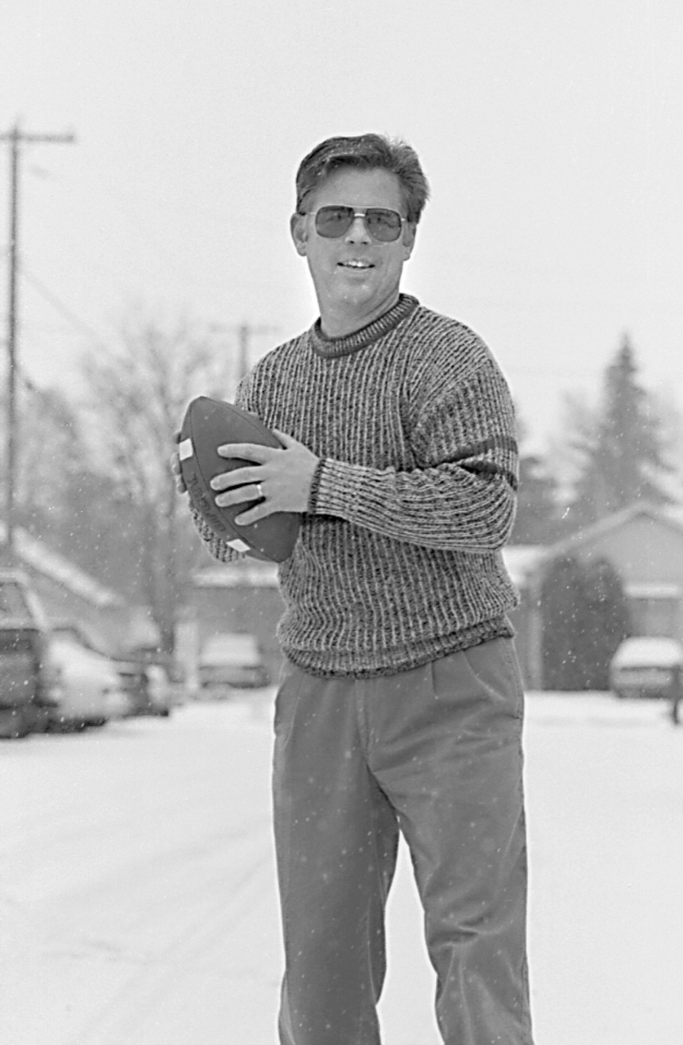 Inter Lake Sports Editor David Lesnick tosses around the pigskin in 1998. Lesnick is retiring after nearly 27 years at the paper. (Daily Inter Lake file)