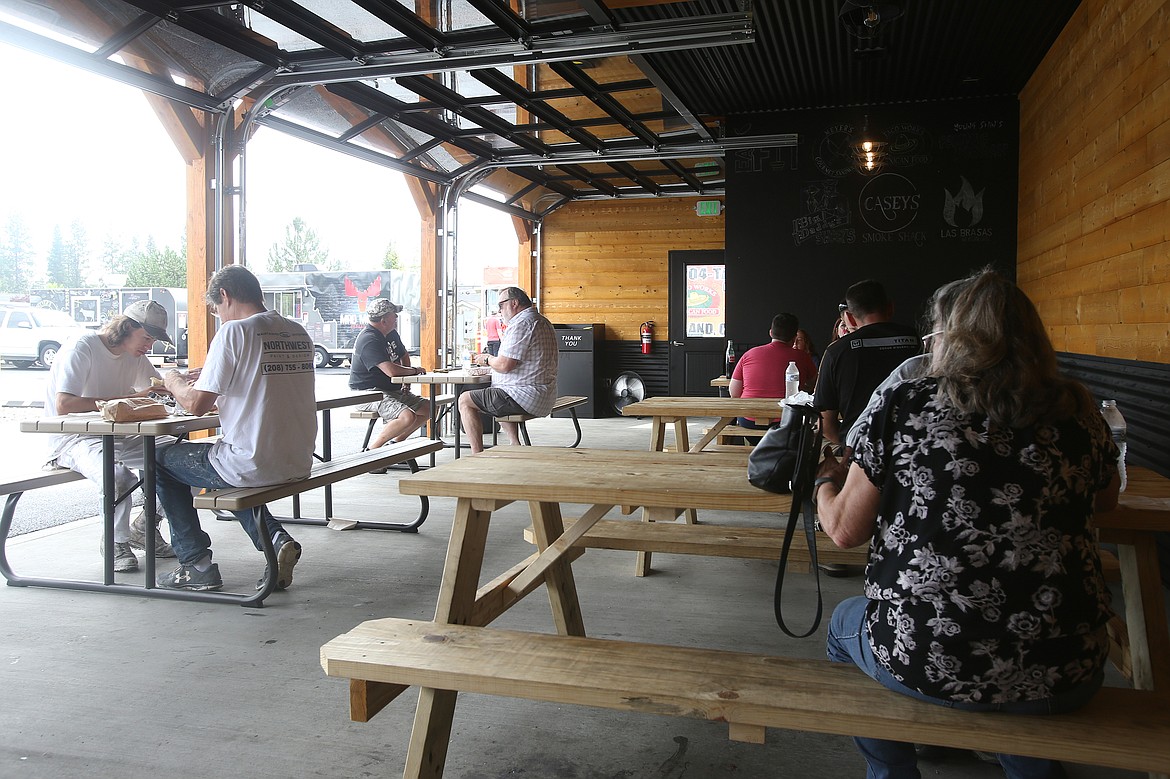 Guests are welcome to enjoy their Prairie Pavilion food truck dining experience on site in a covered picnic seating area. (LOREN BENOIT/Press)