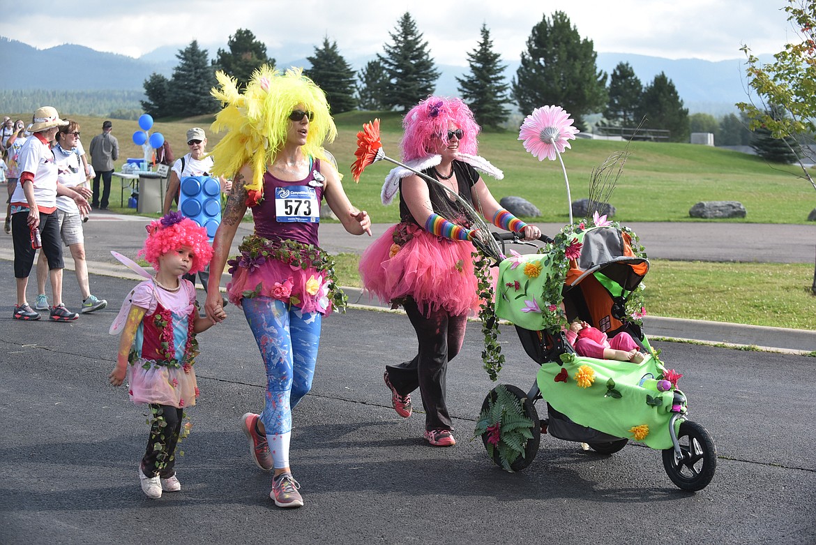 A group of runners were all decked out for the Great Fish Community Challenge Color Run. (Heidi Desch/Whitefish Pilot)