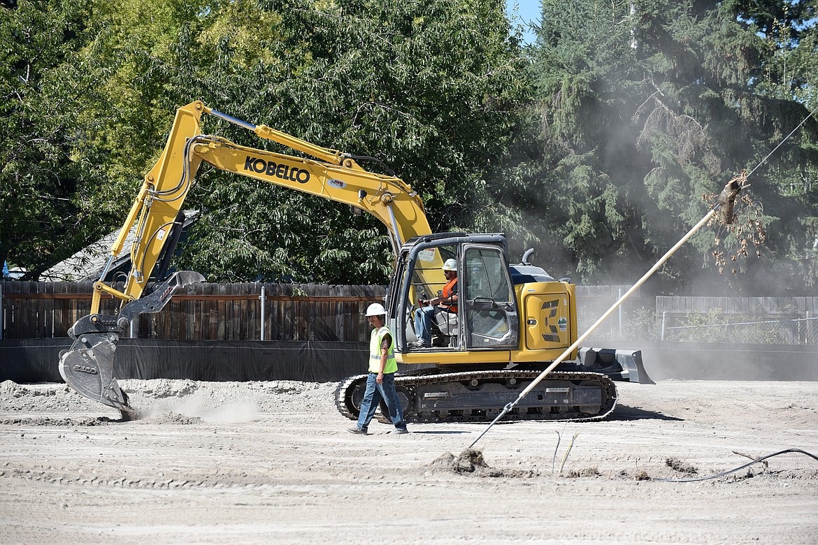 Crews work last week on the Edgewood Place property that will eventually house the Alpenglow Apartments, a 38-unit affordable housing development. (Heidi Desch/Whitefish Pilot)