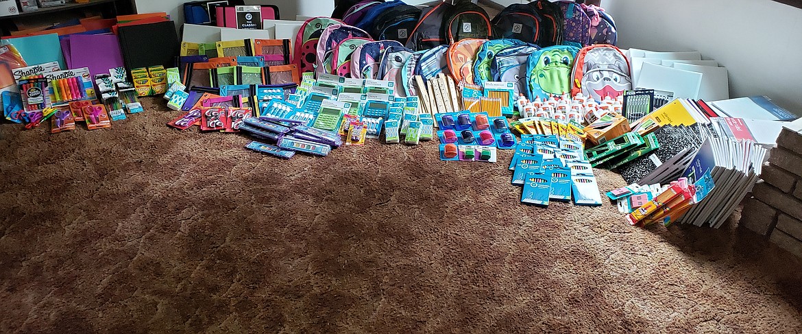 Courtesy photos
Several area businesses joined forces to donate and distribute more than $500 of school supplies to local children who needed them.