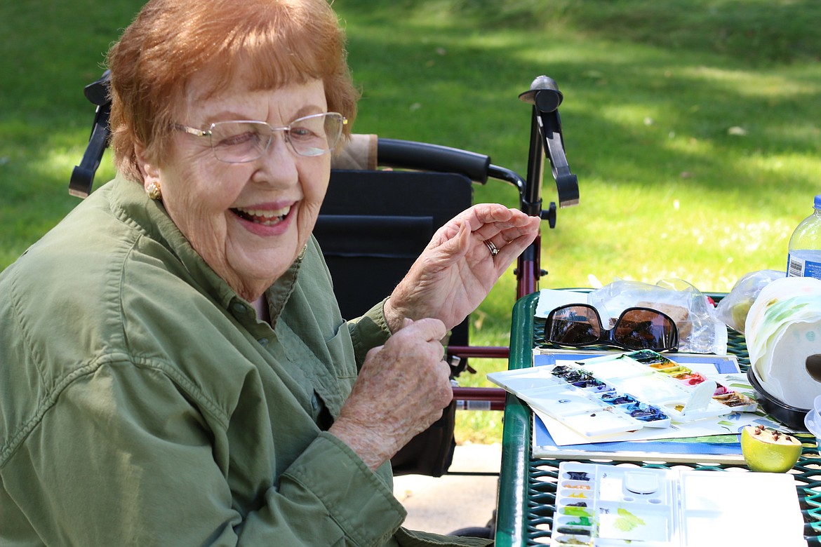 Photo by MANDI BATEMAN
Wendy McClintock, having fun working on a watercolor painting.