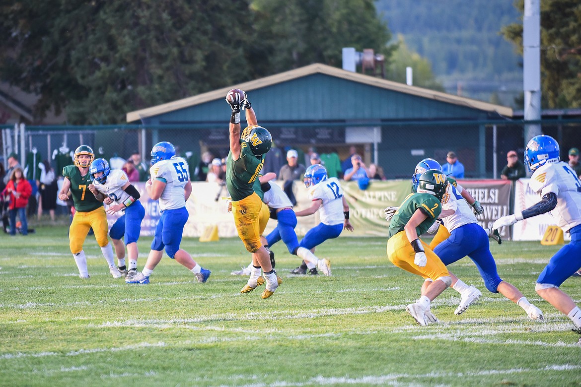 Devin Beale skies for the reception during Friday&#146;s loss to Libby. (Daniel McKay/Whitefish Pilot)