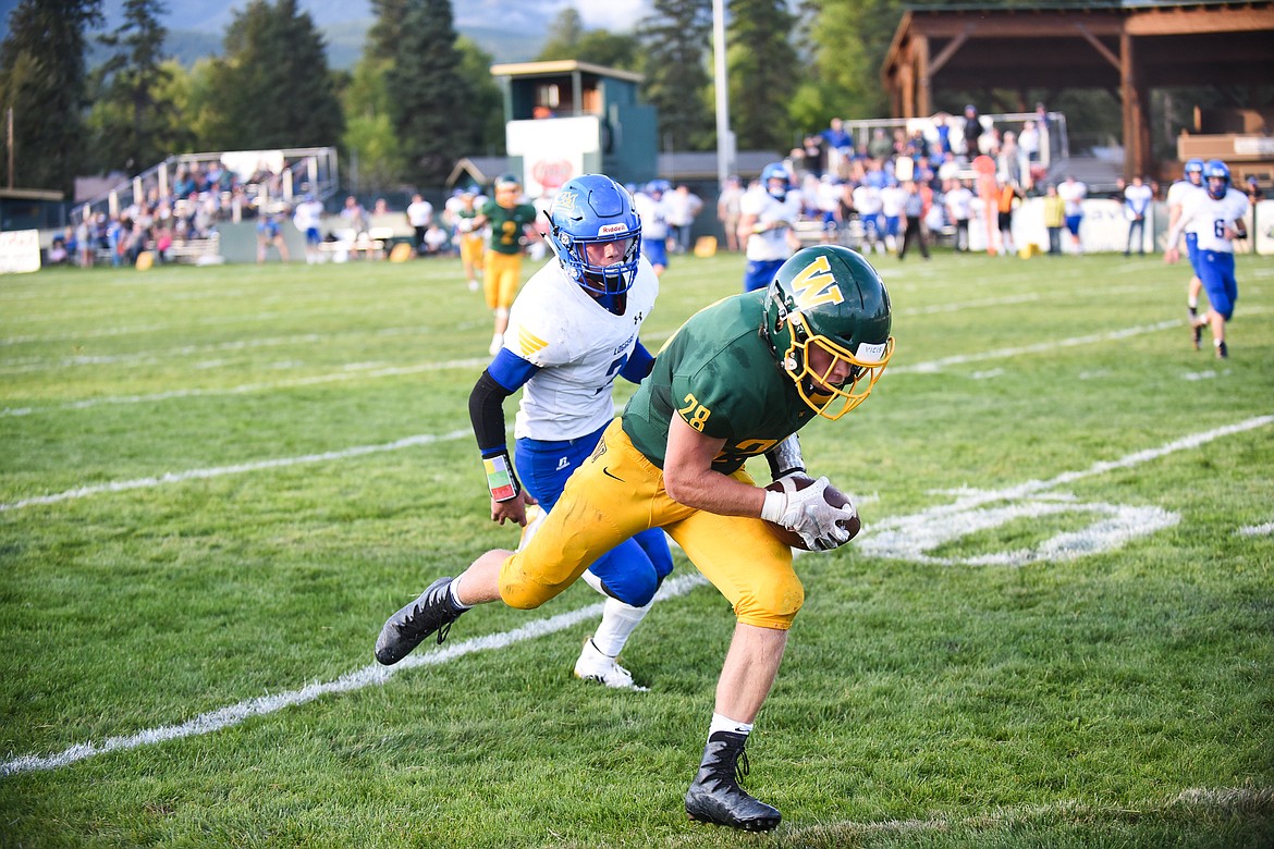 Zach Veneman fights for yards after the catch during Friday&#146;s loss against Libby. (Daniel McKay)