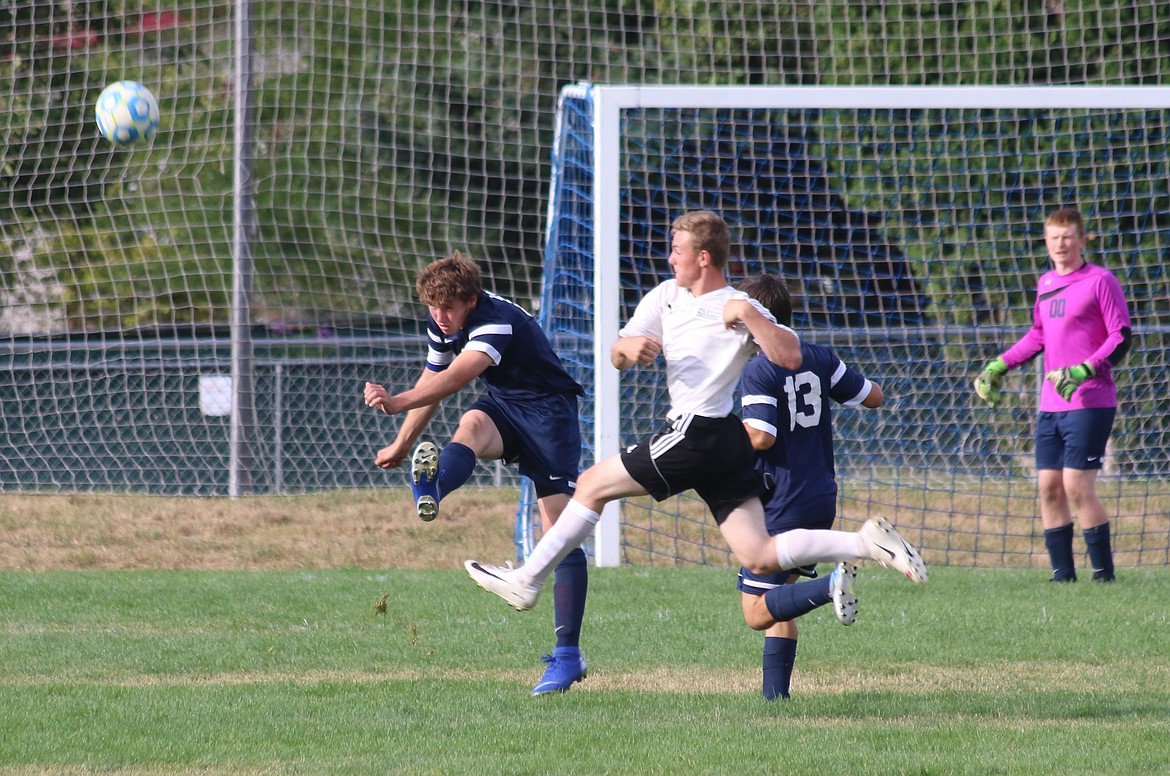 Photo by MANDI BATEMAN
Captain Dalin Foster clears the ball before a St. Maries attacker can reach it during the Badgers&#146; season-opening match with the visiting Lumberjacks on Aug. 29. St. Maries won 2-1.