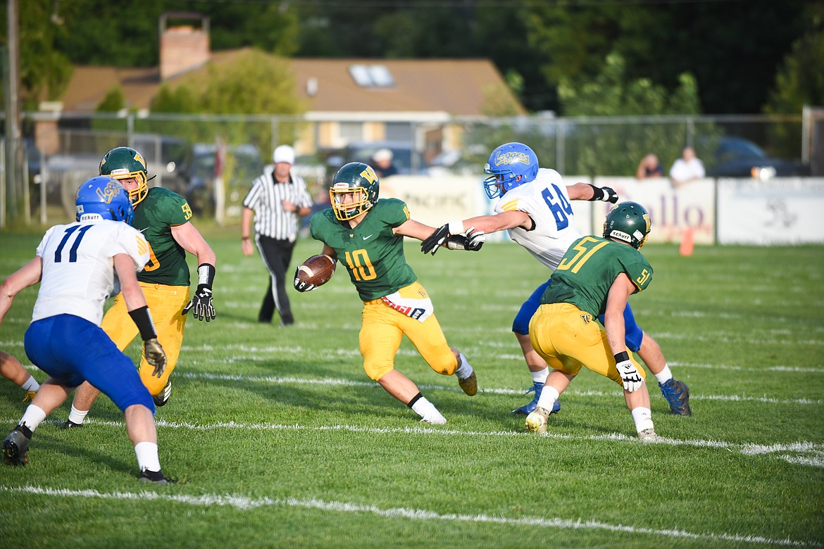 Devin Beale cuts by a defender during Friday&#146;s loss against Libby. (Daniel McKay)