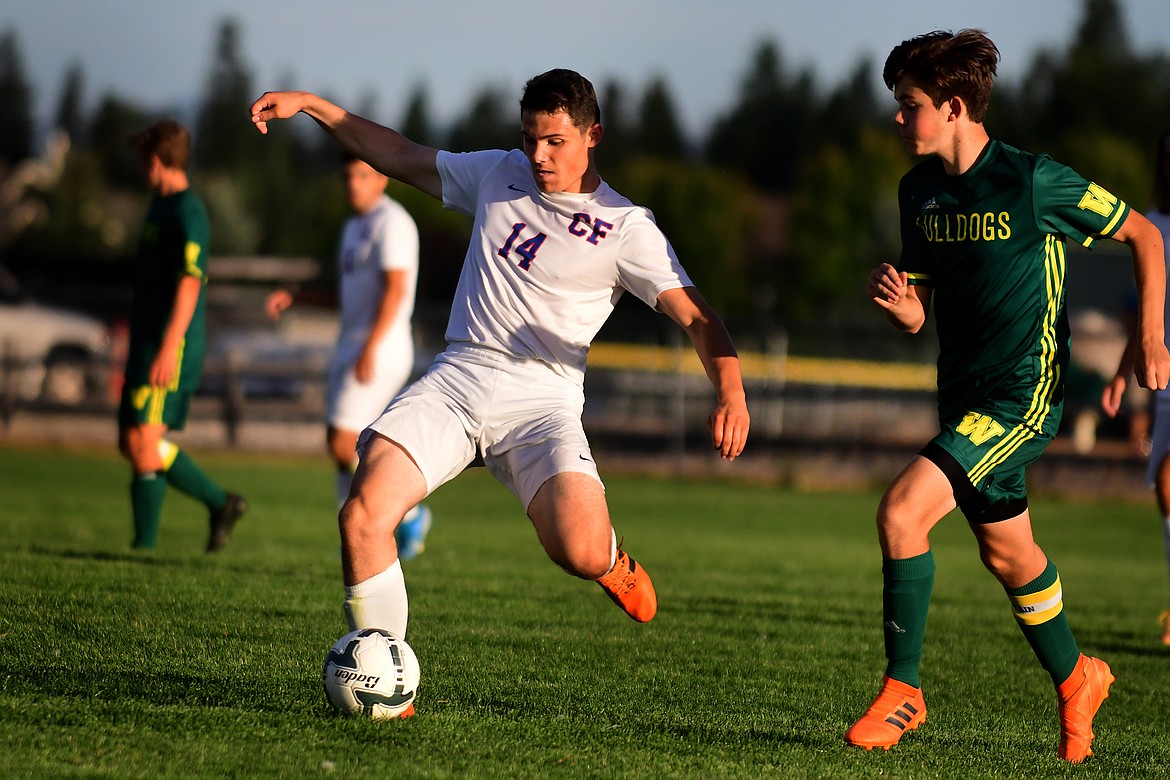 Wildcat Tyler Hull moves the ball up the field.