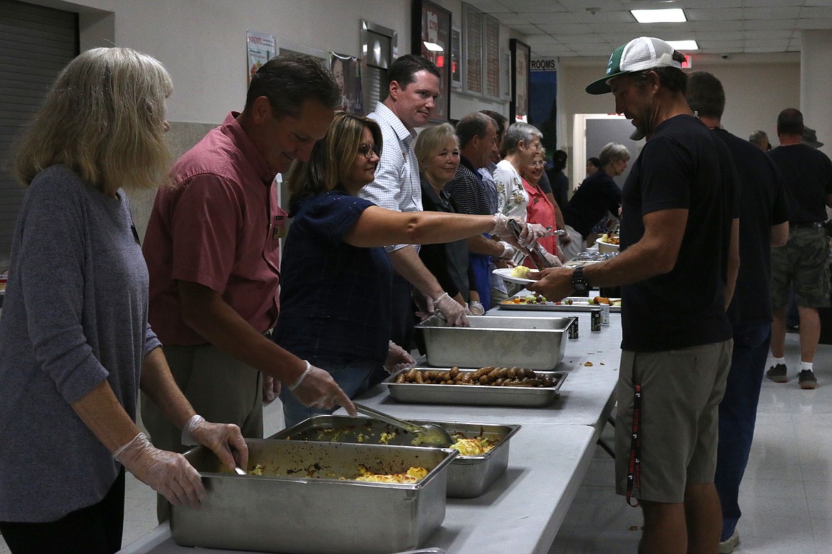 (Photo by MARY MALONE)
Panhandle Alliance for Education members served breakfast to administrators, teachers, staff and supporters of the Lake Pend Oreille School District during the annual &#147;Welcome Back Breakfast&#148; at Sandpoint High School on Thursday.