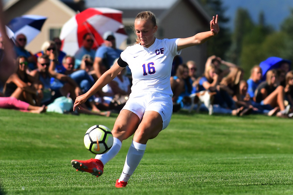 Flora Jarvis sends a free kick towards the Whitefish goal.