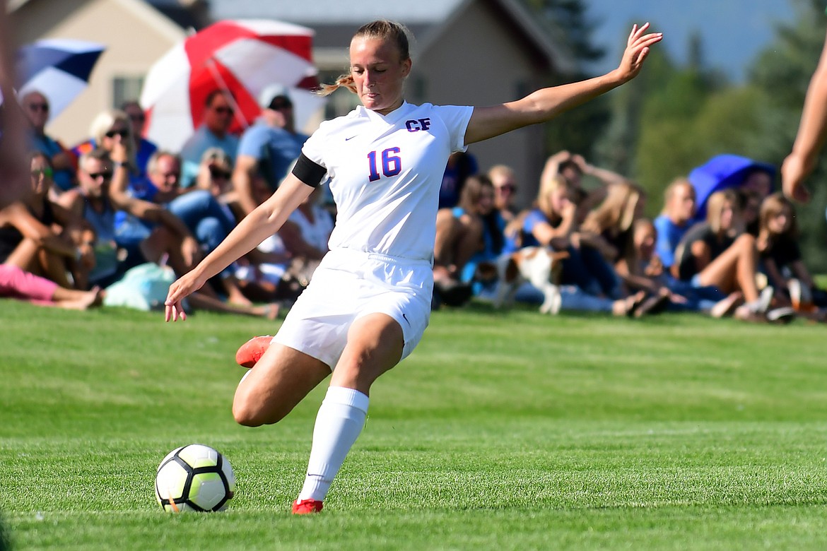 Wildkat Flora Jarvis sends a free kick towards the goal.