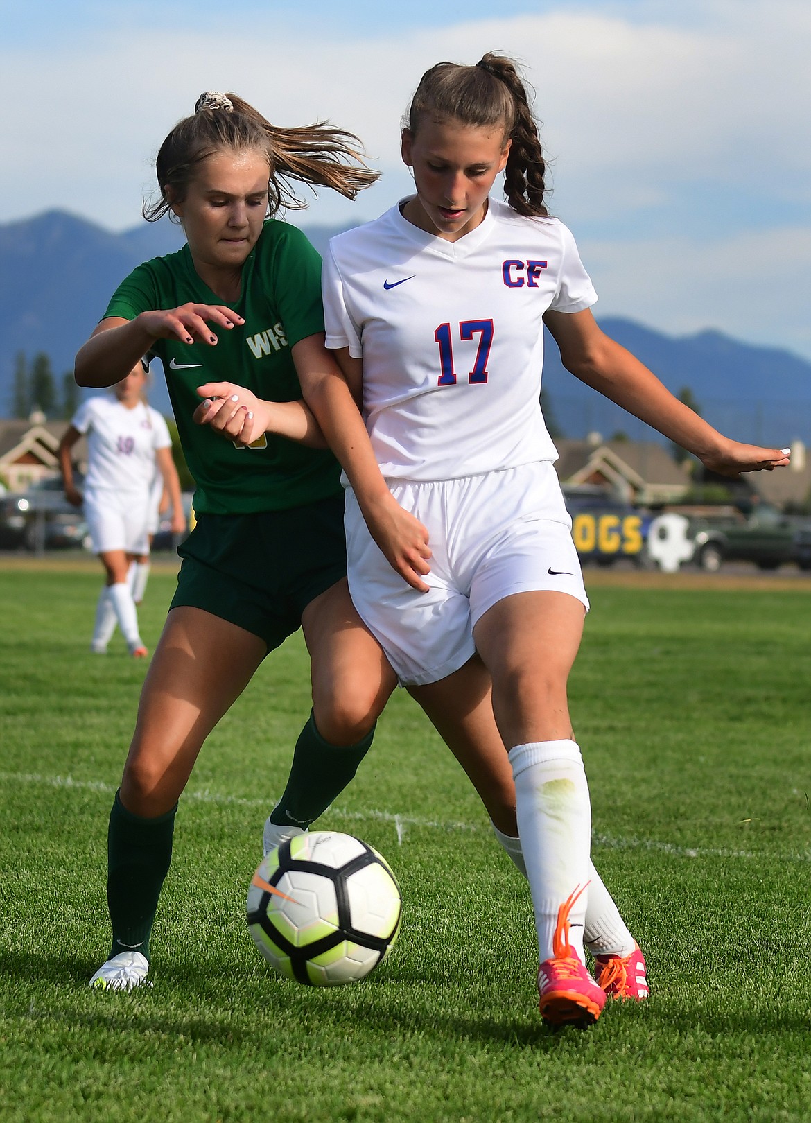 Wildkat Gwen Jarvis battles for the ball.