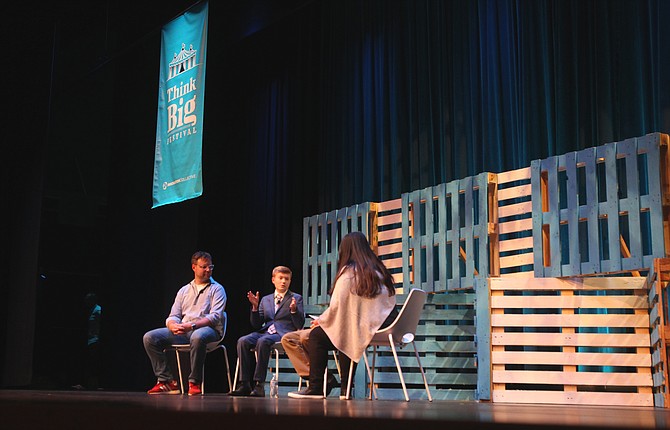 Co-founder and CEO of xCraft JD Claridge, left, and 13-year-old Ability App inventor Alex Knoll engage with panel moderator Tonya Hall during the "A Better World" session of the Think Big Festival on the North Idaho College Campus in 2018.