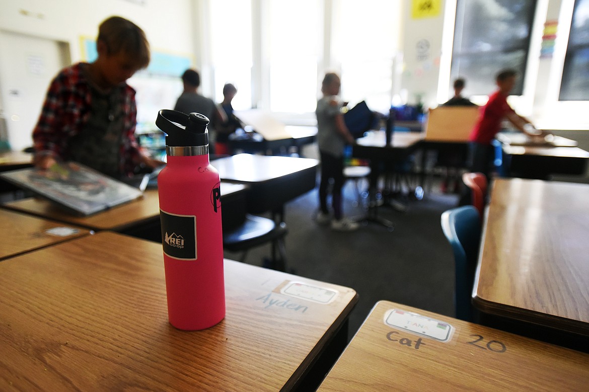 Students are encouraged to bring drink containers to class in Jane Dews' fourth-grade classroom, called &quot;the hottest classroom in the building,&quot; since there is only one water fountain shared by several classrooms on the second floor at Glacier Gateway Elementary School in Columbia Falls on Wednesday, Sept. 11. (Casey Kreider/Daily Inter Lake)