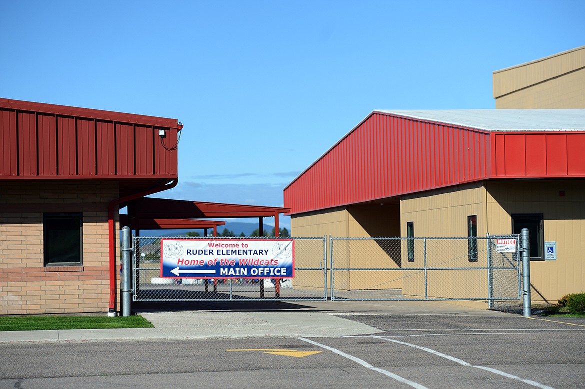 A security fence outside a breezeway that separates the two school buildings at Ruder Elementary School in Columbia Falls on Wednesday, Sept. 11. (Casey Kreider/Daily Inter Lake)
