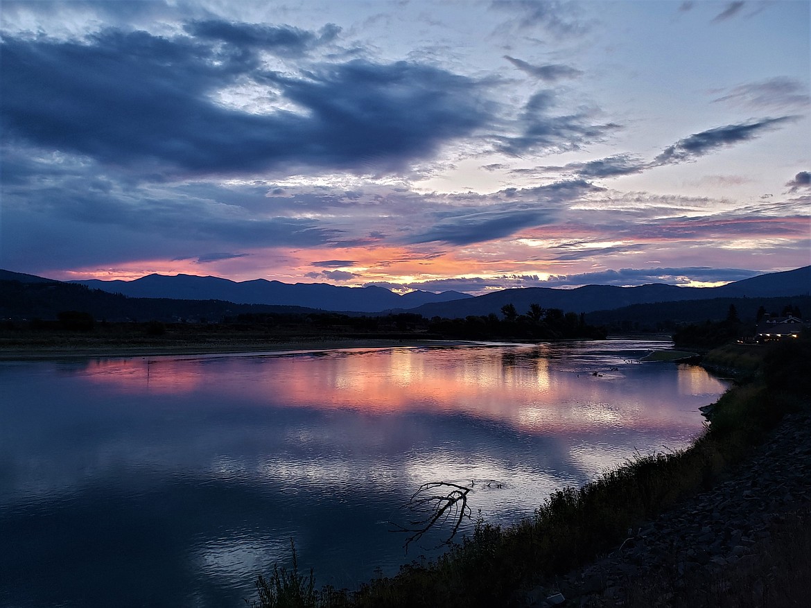 Photos by HARALD SCHARNHORST
Harald Scharnhorst took these spectacular pre-sunrise (left) and sunrise photos from the south end of the Kootenai Bridge on Friday, Sept. 13. Views and colors like these are almost enough to make one want to wake up before dawn!