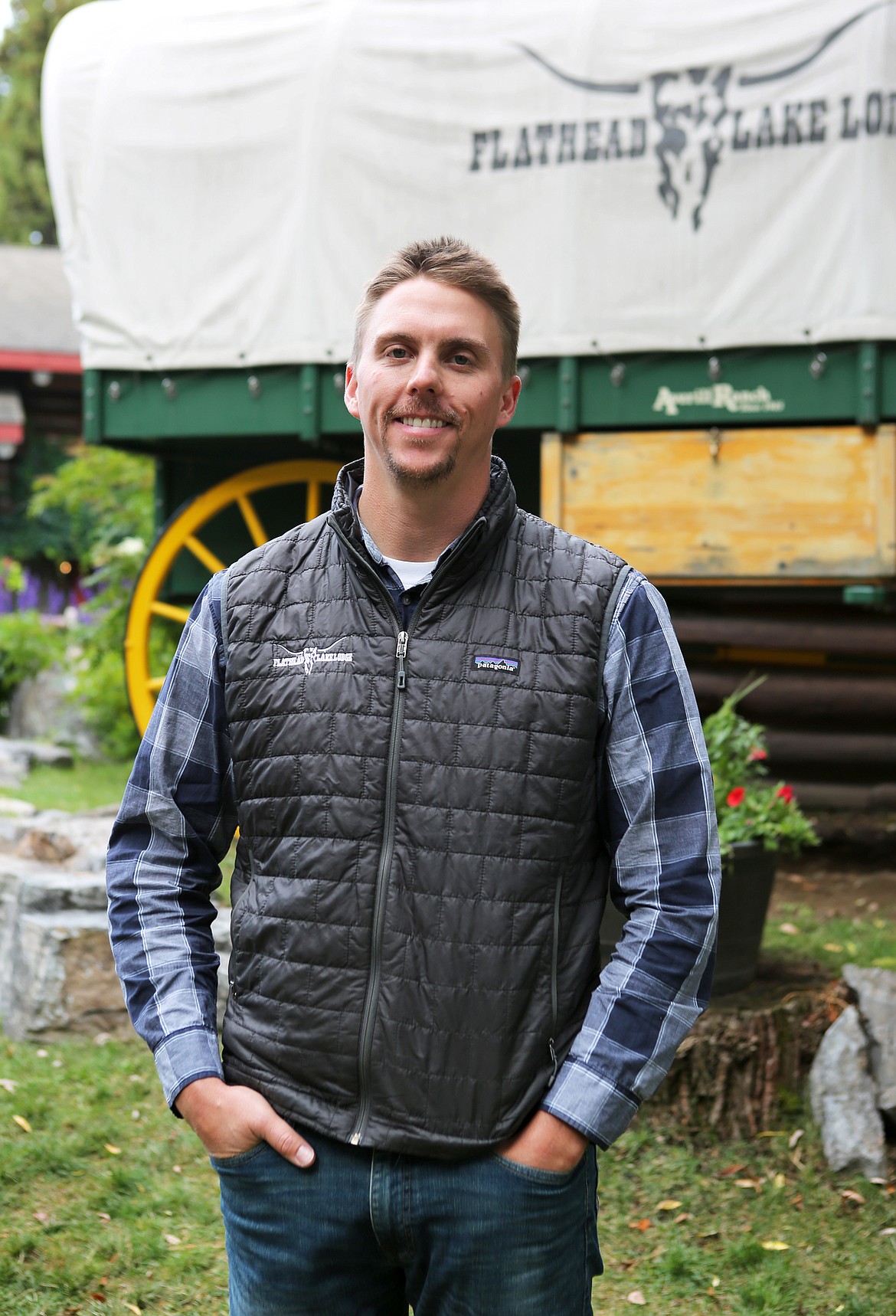 Flathead Lake Lodge general manager Chase Averill is pictured outside the lodge Wednesday, Sept. 11. To celebrate the lodge&#146;s 75th anniversary next year, the Bigfork guest ranch will host 20 children with serious medical conditions for a Week of Hope. (Mackenzie Reiss/Daily Inter Lake)