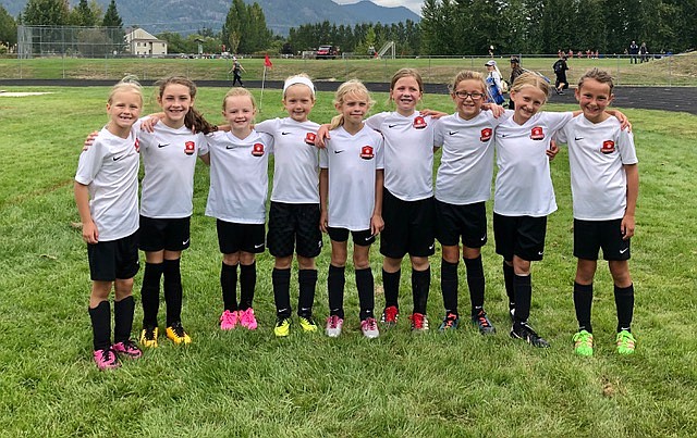 Courtesy photo
The Thorns North FC 11 Girls soccer team took second place in the 2019 Pend Oreille Cup in Sandpoint with a record of 3 wins 1 loss. The Thorns beat the Sandpoint Strikers FC White 3-2, on goals by Evelyn Haycraft, Brightyn Gatten and Vivian Hartzell. the Thorns lost 3-1 to the EW Surf SC G11/12. Riley Greene had the lone Thorns goal. The Thorns beat the Thorns North FC G12 7-1. Kylie Lorona scored 3 goals for the Thorns, Brightyn Gatten 2 goals and Emily Hackett one. The final game was a 3-2 win by the Thorns over We Huffman 2011. Amelia Liddiard, Vivian Hartzell and Brightyn Gatten scored for the Thorns. Pictured from left are Brightyn Gatten, Kylie Lorona, Olivia Hynes, Riley Greene, Evelyn Haycraft, Emily Hackett, Avery Wilson, Amelia Liddiard and Vivian Hartzell.