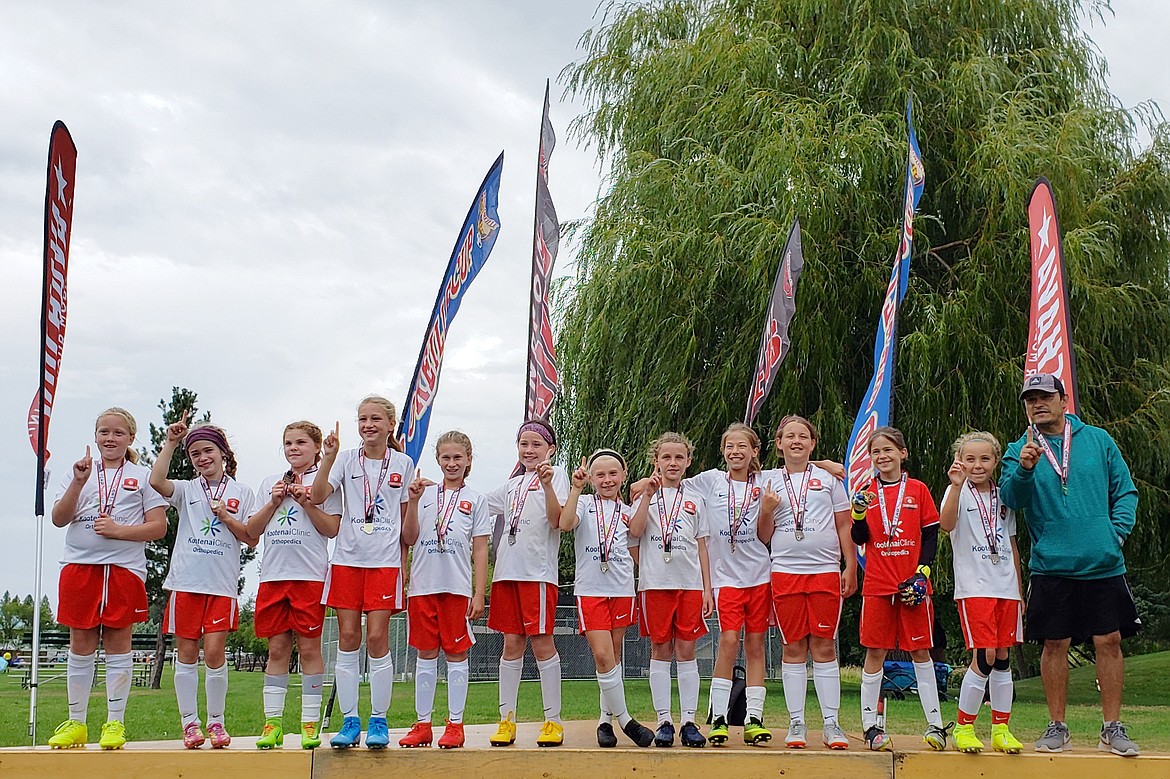 Courtesy photo
The Thorns North FC 09 Girls Green soccer team won the U11 Girls Silver division at the Sandpoint Pend Oreille Cup last weekend in Sandpoint. Savannah Spencer was in goal and Ryann Blair scored the championship-winning goal. From left are Molly Carroll, Clara Schmidt, Ryann Blair, Ava Roberts, Aspen Liddiard, Phinalley Voigt, Dakota Hoch, Sierra Sheppard, Eliza Murphy, Addison Karoblis, Savannah, Tayla Ruchti and coach Tomas Barrera.