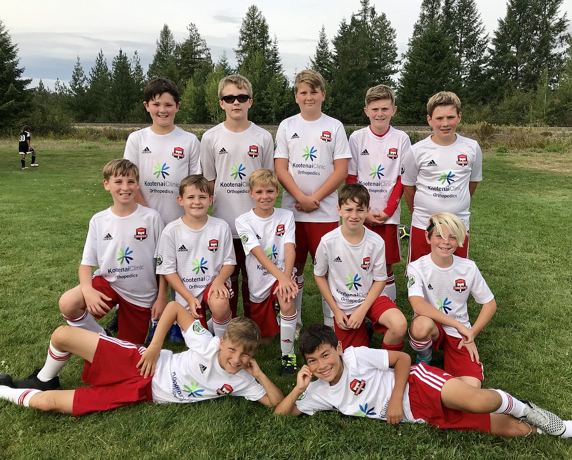 Courtesy photo
The Timbers North FC 08 Boys White soccer team participated in the Pend Oreille Cup in Sandpoint. Over the weekend, Reilly Smith, Charlie Dircksen, and Karter Engebretsen each scored 2 goals, Preston Samayoa and Collin Storey had a goal and an assist. Bear Coleman and Davey Dance each scored once. Collin Storey, Donovan Bonar and Canon St. John teamed in goal for the Timbers North FC. Kasey Lafoon coached the team. The team starts their regular season games this week. In the front row from left are Colton Rush and Preston Samayoa; second row from left, Reilly Smith, Karter Engebretsen, Chuck Mattila, Canon St. John and Donovan Bonar; and back row from left, Charlie Dircksen, Bear Coleman, Collin Storey, Kiernin Ridley and Hudson Barlow. Not pictured is Davey Dance.