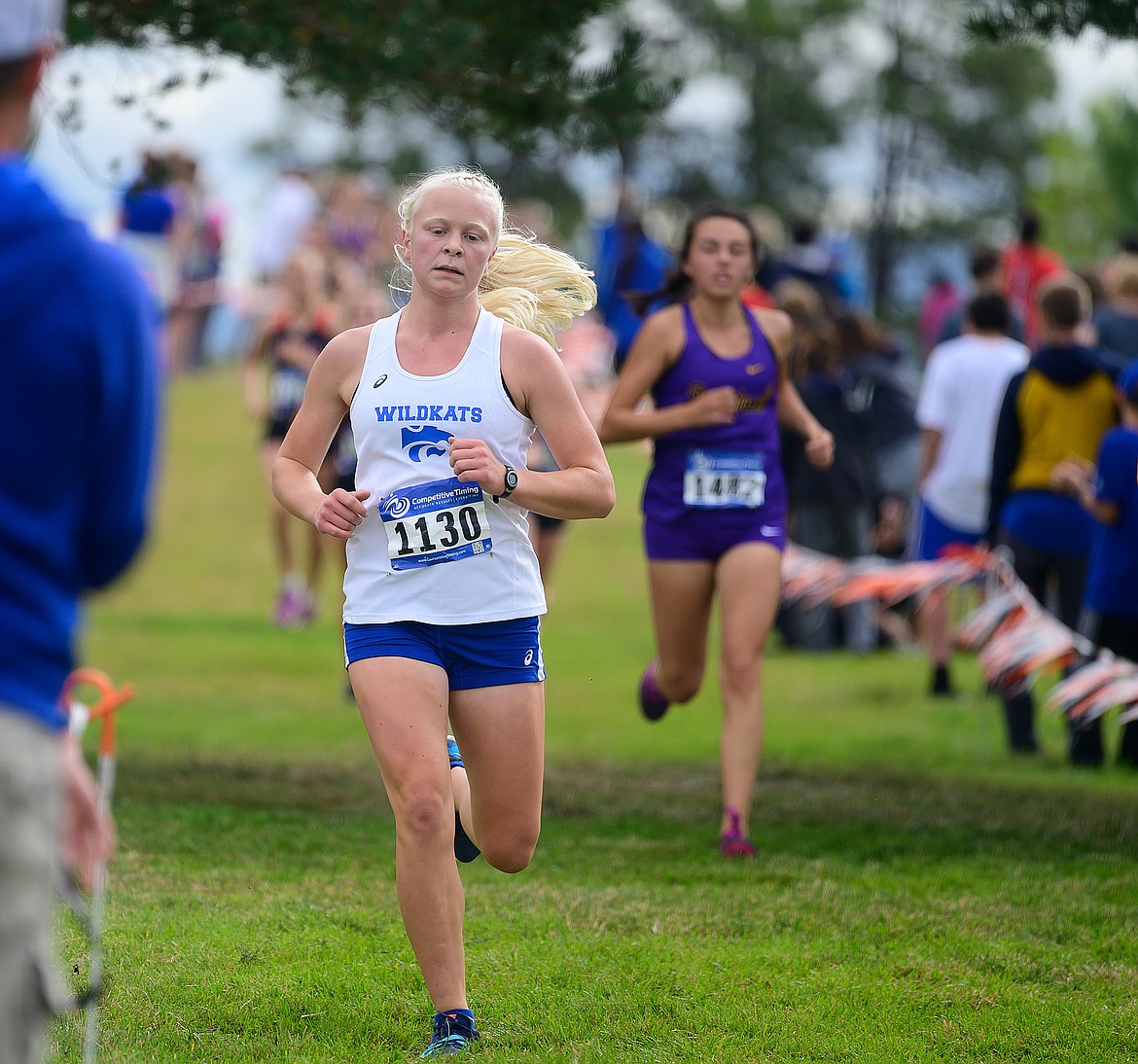 Lara Erickson runs for the Wildkats at Rebecca Farm Saturday. (Chris Peterson photo)