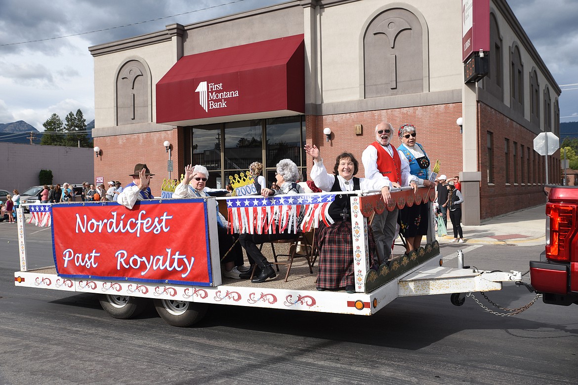 NORDICFEST PAST royalty members wave to the crowd on Mineral Avenue during Saturday&#146;s parade in Libby. (Scott Shindledecker/The Western News)